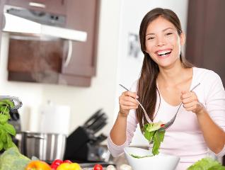Girl eating healthy salad